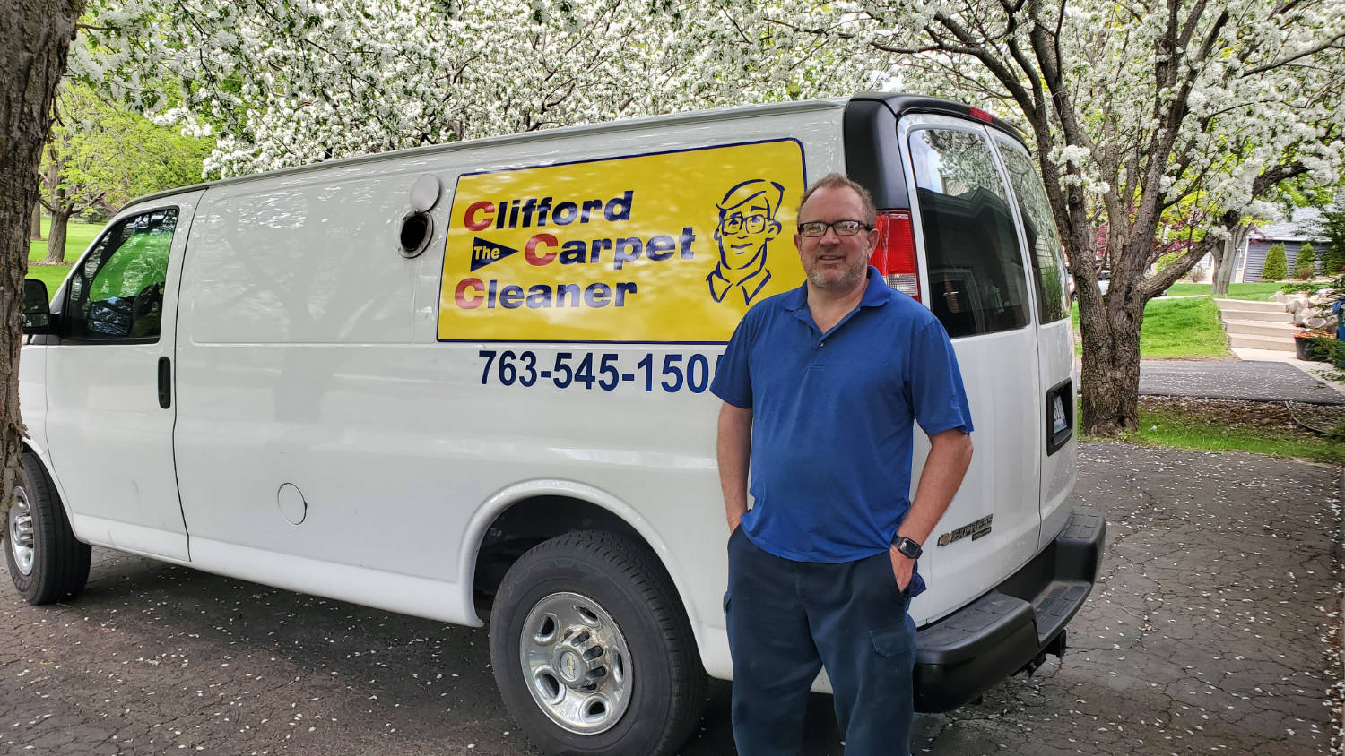 A person using a carpet cleaner